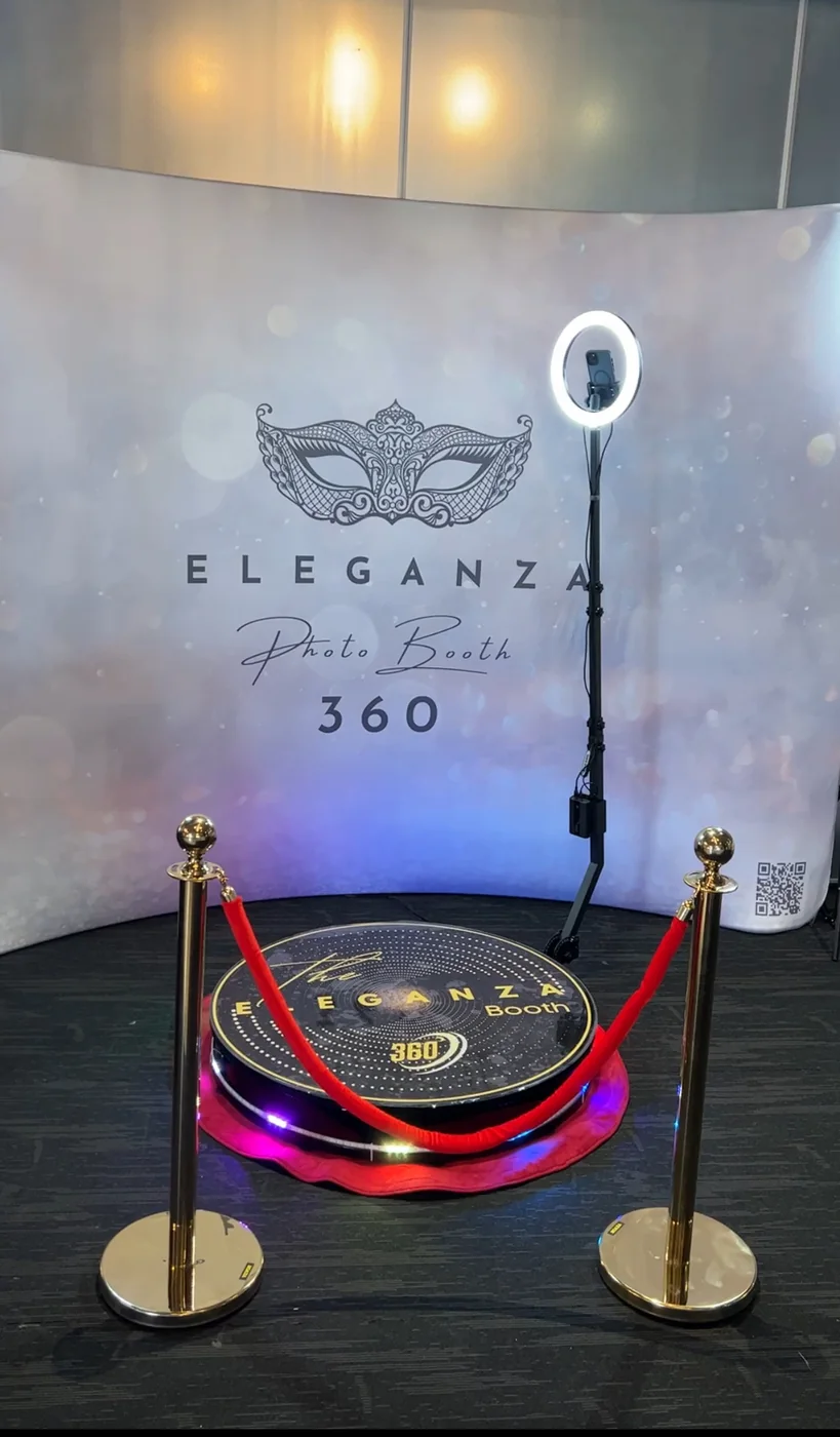 The 360 booth set up with a silver backdrop at a Miami event