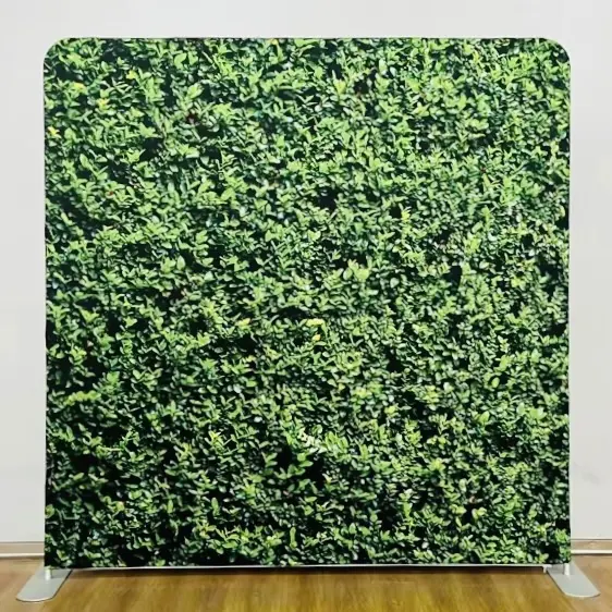Greenery photo booth backdrop at a Miami event