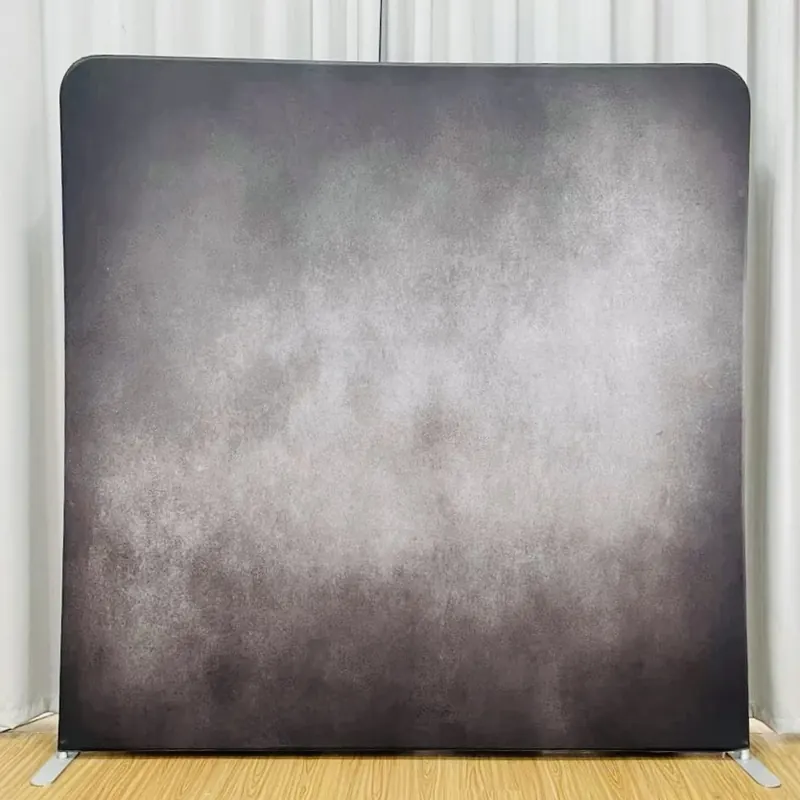 Grey textured photo booth backdrop at a Miami event