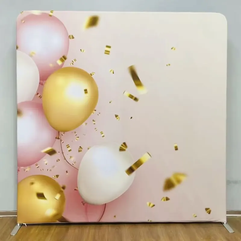 Pink and gold balloon photo booth backdrop at a Miami quinceañera