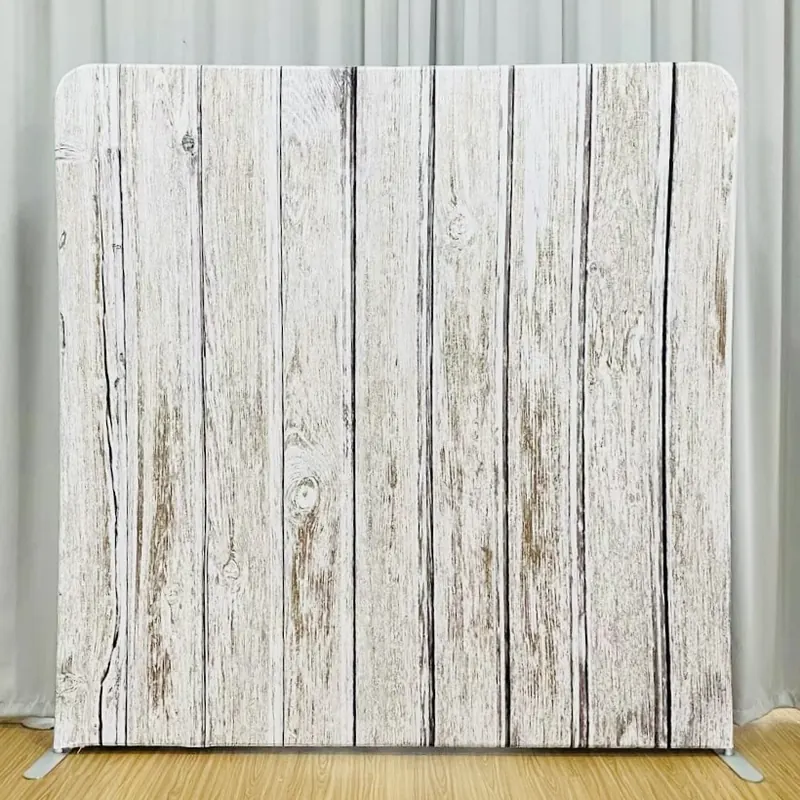 Whitewashed wood photo booth backdrop at a Miami event
