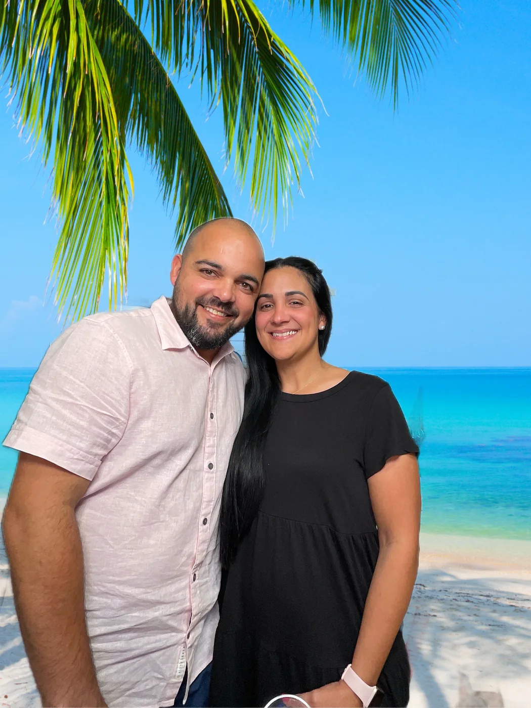 Guests at the photo booth with a beach digital background at a first birthday party in Miami