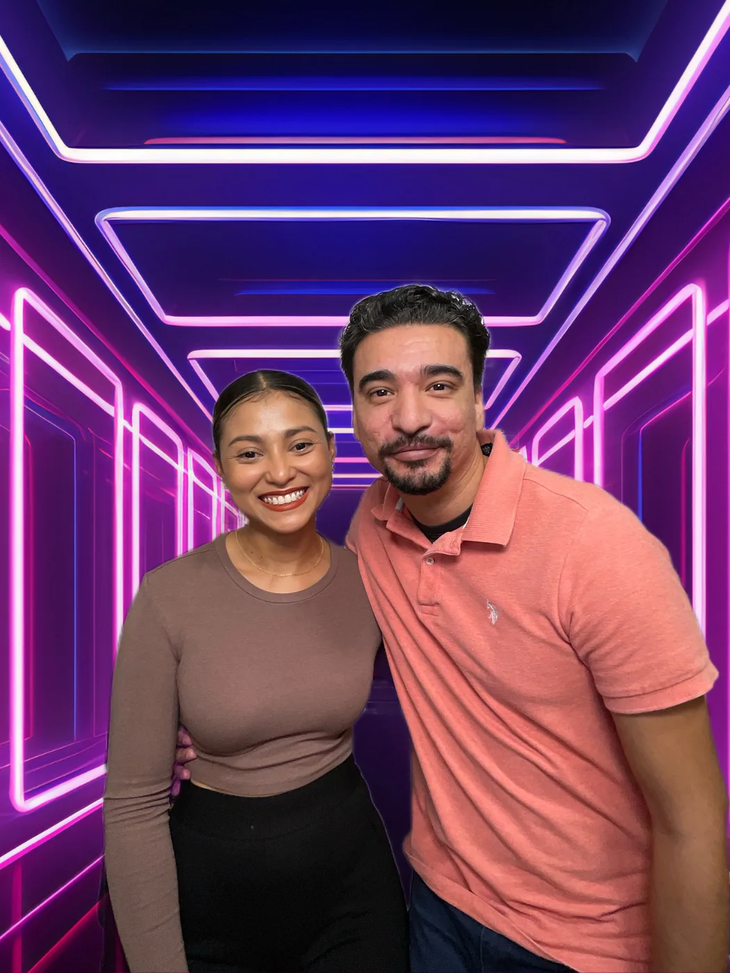 Guests at the photo booth with a neon digital background at a first birthday party in Miami