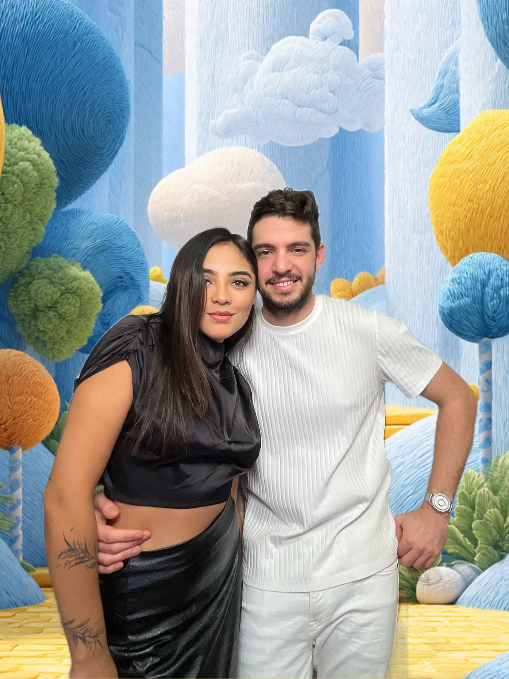 Guests at the photo booth with a fantasy digital background at a first birthday party in Miami