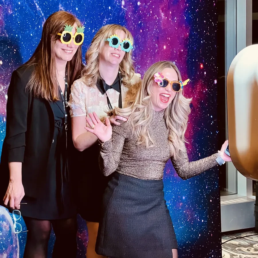 Corporate gala photo booth against a galaxy backdrop in Miami