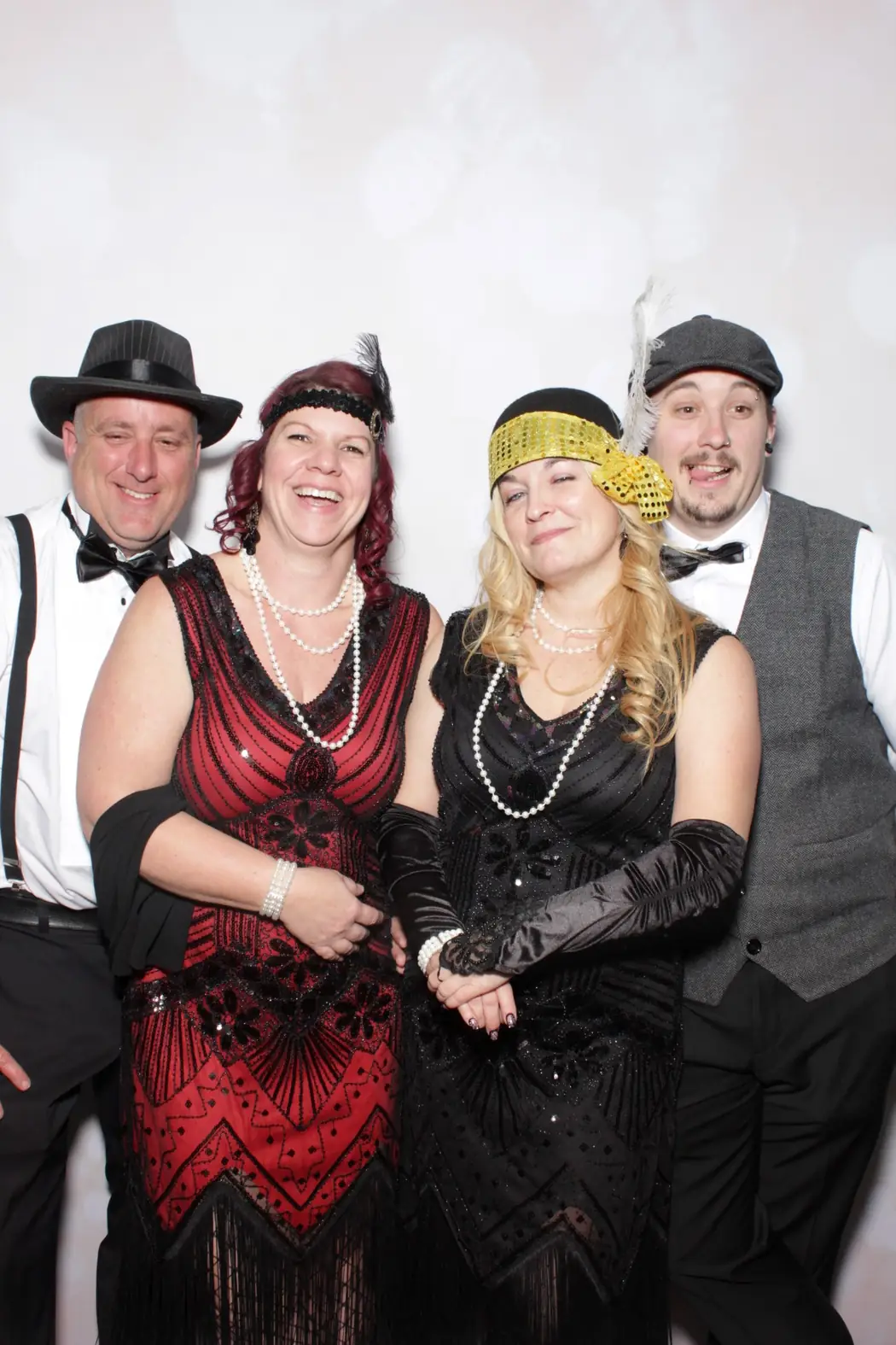 Guests in 1920s Gatsby costume at the photo booth during a Miami corporate gala