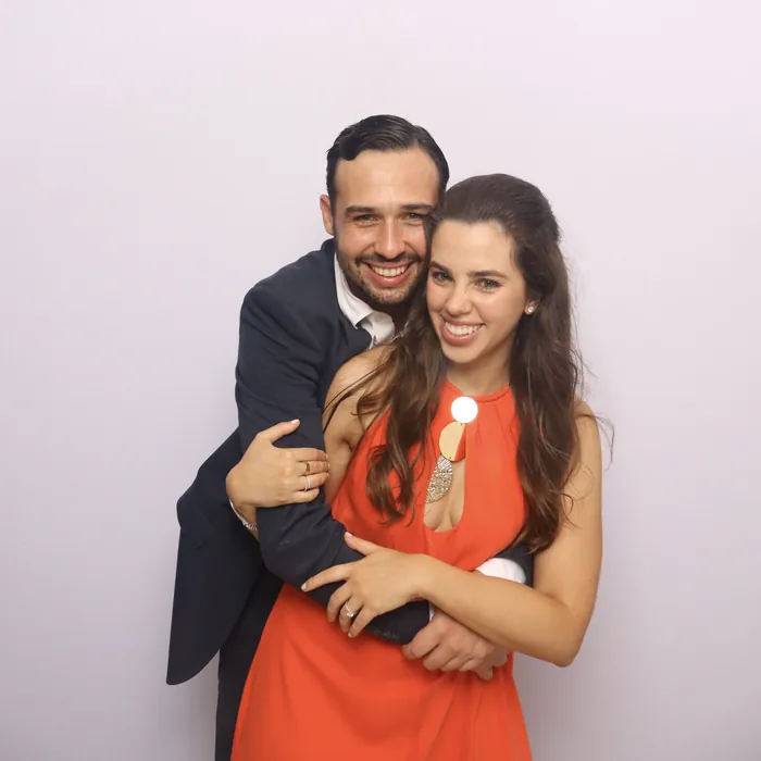 Couple posing for a colorful DSLR photo booth portrait