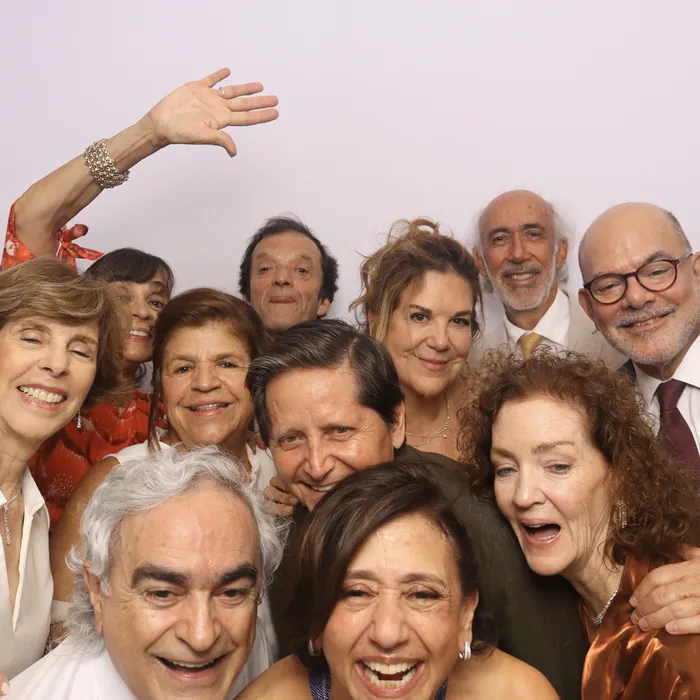 Large group of guests fitting into a DSLR photo booth portrait