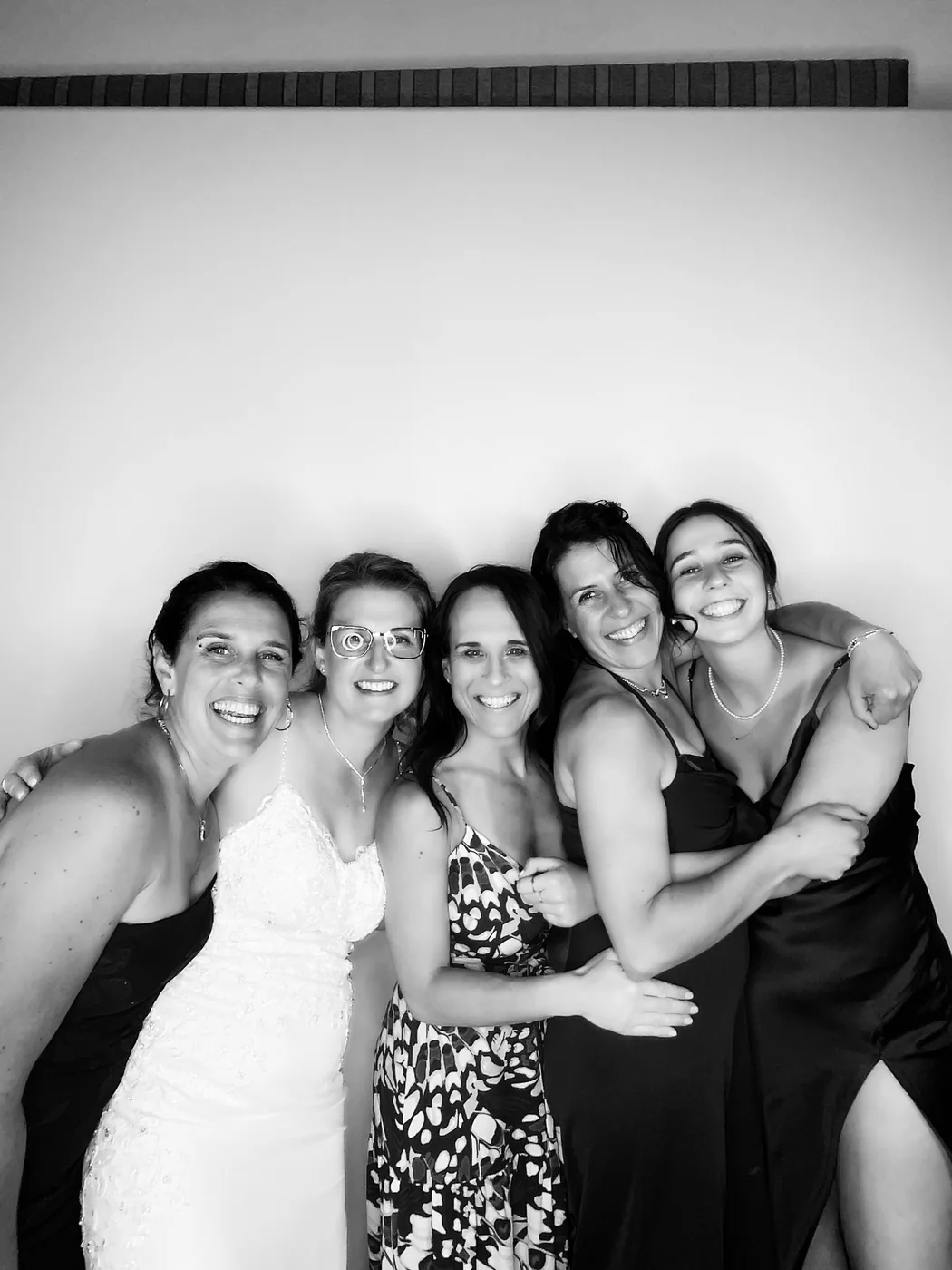 Black and white glam portrait of a bride with friends at a Miami wedding