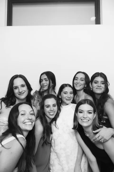 Wedding party posing in the black-and-white Glam Booth