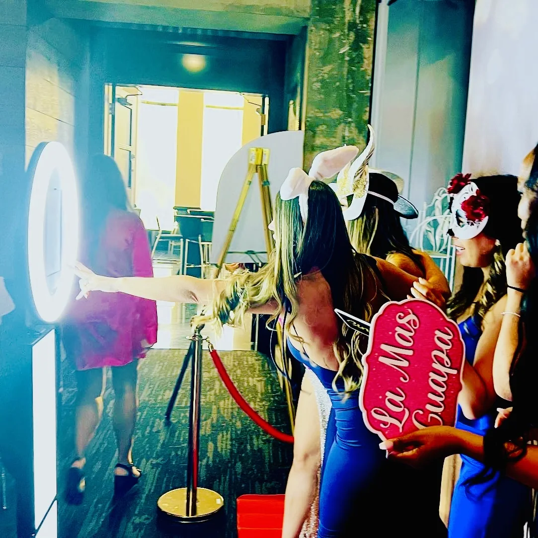 Guests queueing for the photo booth at a Miami wedding venue
