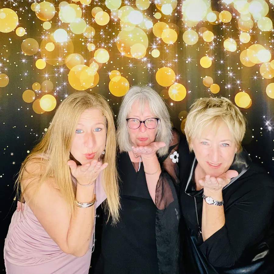 Photo booth against a gold sequin backdrop at a Hialeah celebration