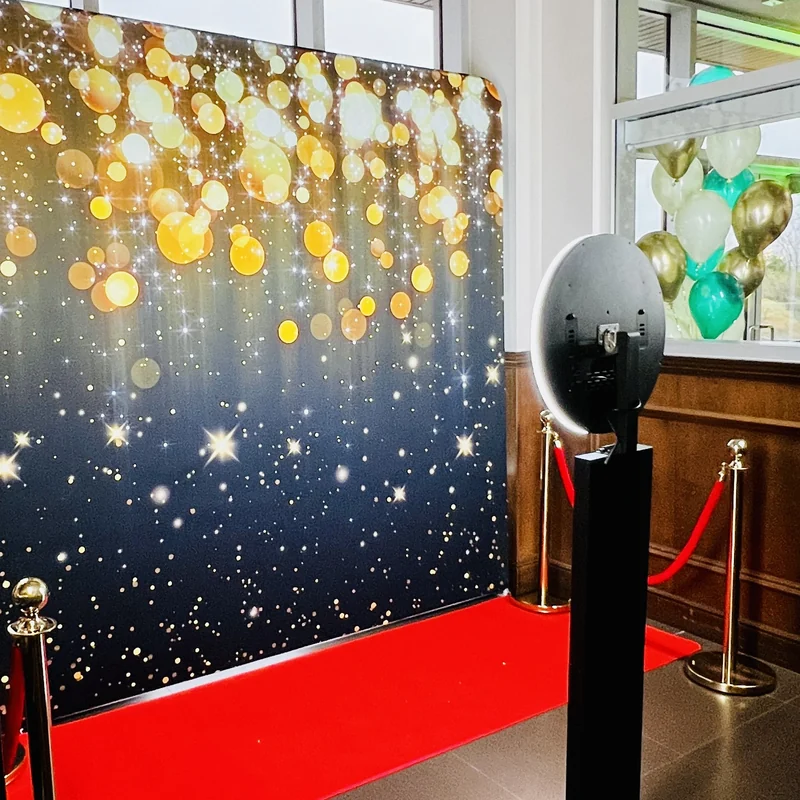 Wedding guests posing at the digital photo booth